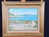 a picture of a painting on a easel with a sailboat in the water
