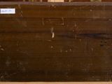 a piece of wood sitting on top of a wooden table