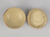 pair of chinese yellow glazed bowls