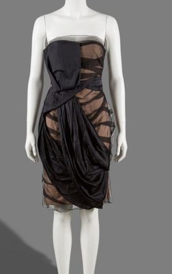 a black and brown dress on a mannequin mannequin mannequin mannequin mannequin mannequin mannequin mannequin mann