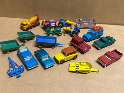 a lot of toy trucks that are sitting on the table