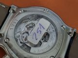 a close up of a watch on a table