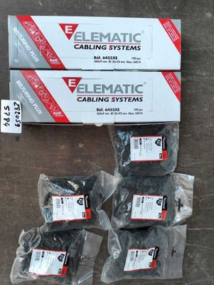 three boxes of elematic cable systems sitting on a table