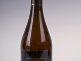 a bottle of wine that is sitting on a table