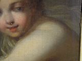 a painting of a young girl in a gold frame