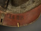 an old leather hat with the word war call written on the side of it
