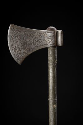 an old axe on a black background
