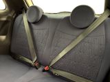 a seat belt that is attached to the back of a car