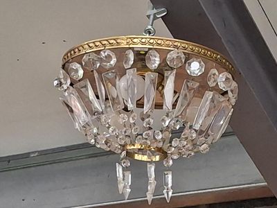 a chandelier hanging from the ceiling of a building
