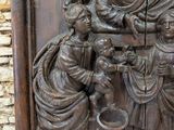 relief of the nativity of the virgin mary and child jesus in a wooden frame