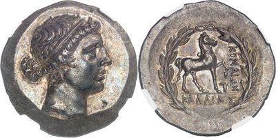 a close up of a coin with a woman and a horse on it
