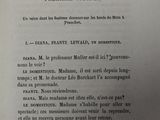 an open book with a black and white image of a man ' s face