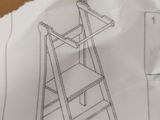 a drawing of a ladder on top of a piece of paper