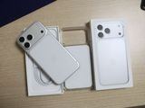 two iphones that are sitting on a table next to each other