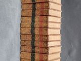 a stack of books sitting on top of each other on a table