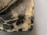 a piece of soap that is sitting on top of a table