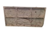a picture of a brick wall that is made of cement