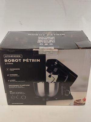 emballage d'un robot Petrin noir et blanc avec un couvercle noir
