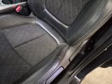 the interior of a car with black leather seats and black trims