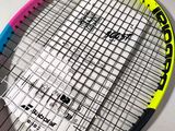 a tennis racquet with a colorful design on it