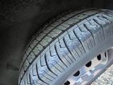 a close up of a tire on the ground