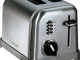 a silver toaster with two slices of bread on it