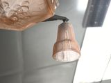 a light that is hanging from the ceiling in the room