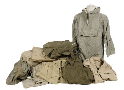 a pile of clothes and a jacket on a white background