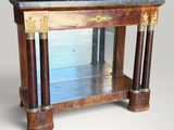une image représentant une table en bois avec un plateau en marbre et deux colonnes