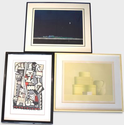 three framed art pieces of various shapes and sizes on a white wall