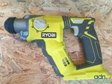a picture of a cordless drill on a piece of plywood
