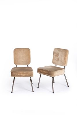these chairs are made of wood and have metal legs