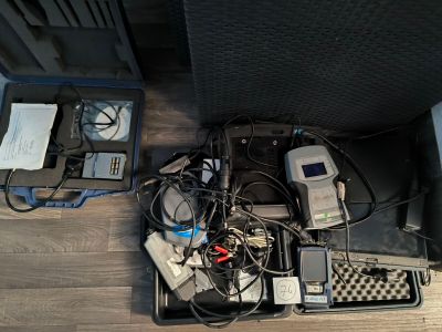 a box full of electronic equipment sitting on the floor