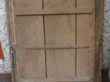 a picture of a picture of a wooden door on the ground