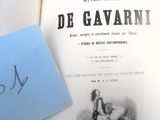 un livre ouvert sur lequel figure l'image d'un homme sur un snowboard