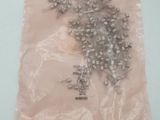 a plastic bag with a bunch of beads in it