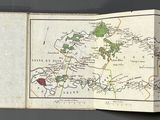 an open book with a map of a country on it