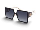 gros plan d'une paire de lunettes de soleil sur une surface blanche