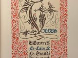 an old book with a picture of a dragon on it