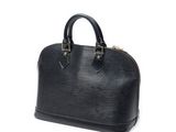un sac Louis Vuitton noir sur fond blanc