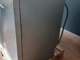 an image of a dishwasher sitting on a pallet