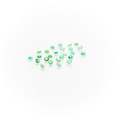 green tourmaline gems on a white background
