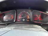 a close up of a car dashboard with various gauges