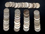 a lot of coins that are sitting on a table