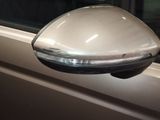 a side view mirror on the side of a car