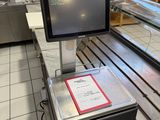 an image of a cash register in a grocery store