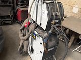 an image of a machine that is in a garage