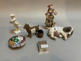 many figurines that are sitting on a table