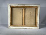 an old picture frame with a picture of a couple of birds in it