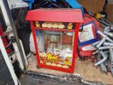 a machine that is sitting in the back of a truck